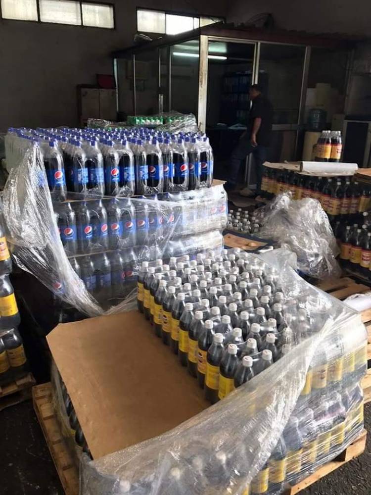 التموين تغلق المستودع الرئيسي لشركة جود للمشروبات الغازية لرفعها أسعار منتجاتها 